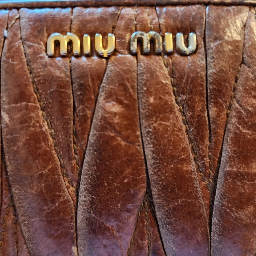 Preowned Miu Miu brown wallet with‎ COA
